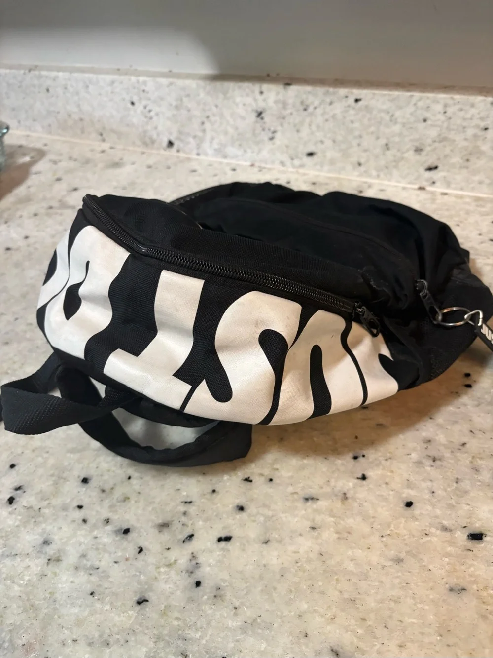 Nike Black and White Mini Backpack with Swoosh Accent